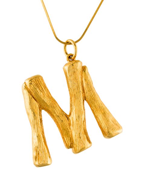 celine alphabet necklace b|Celine alphabet dresses.